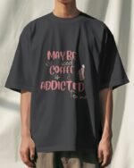 Standing man wearing Black Iced Coffee Unisex Oversized T-Shirt